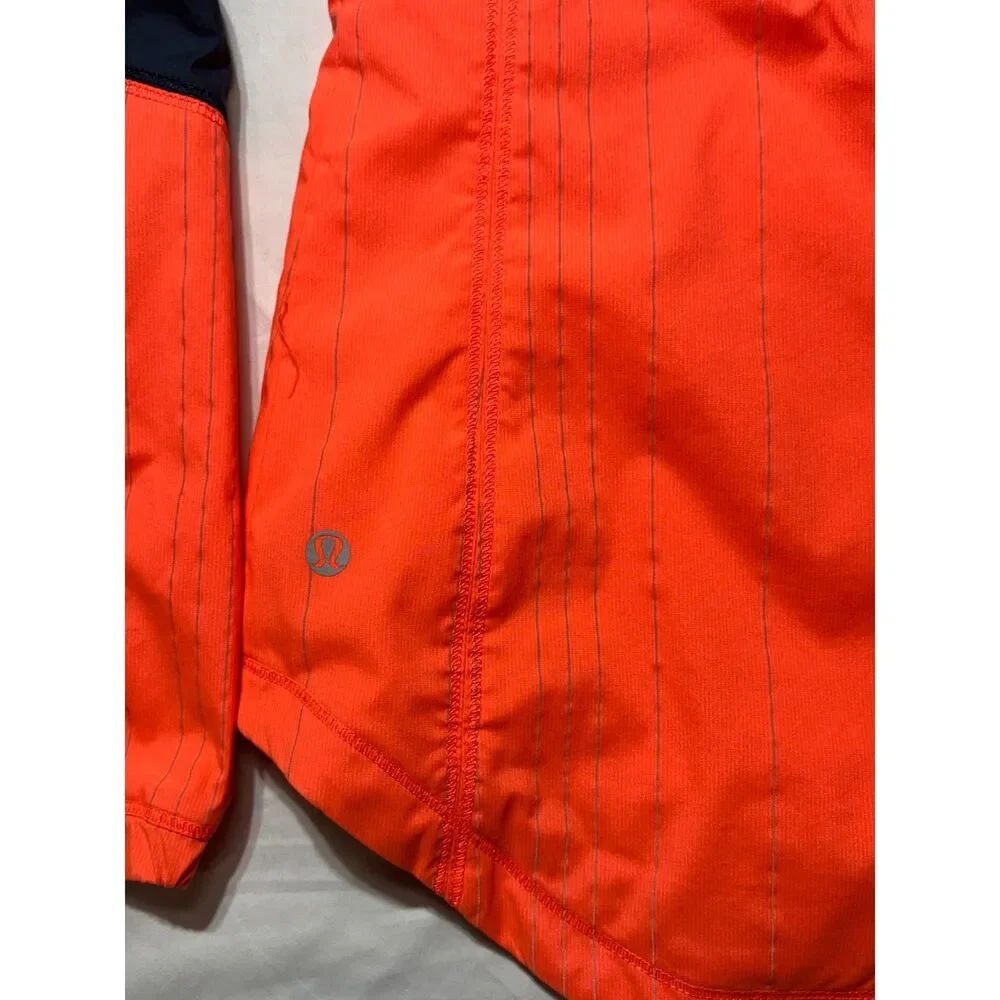 lululemon Get Up & Glow Jacket 4 Orange Navy Reflective Ponytail Hood
